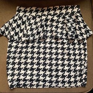Houndstooth peplum mini skirt. Large